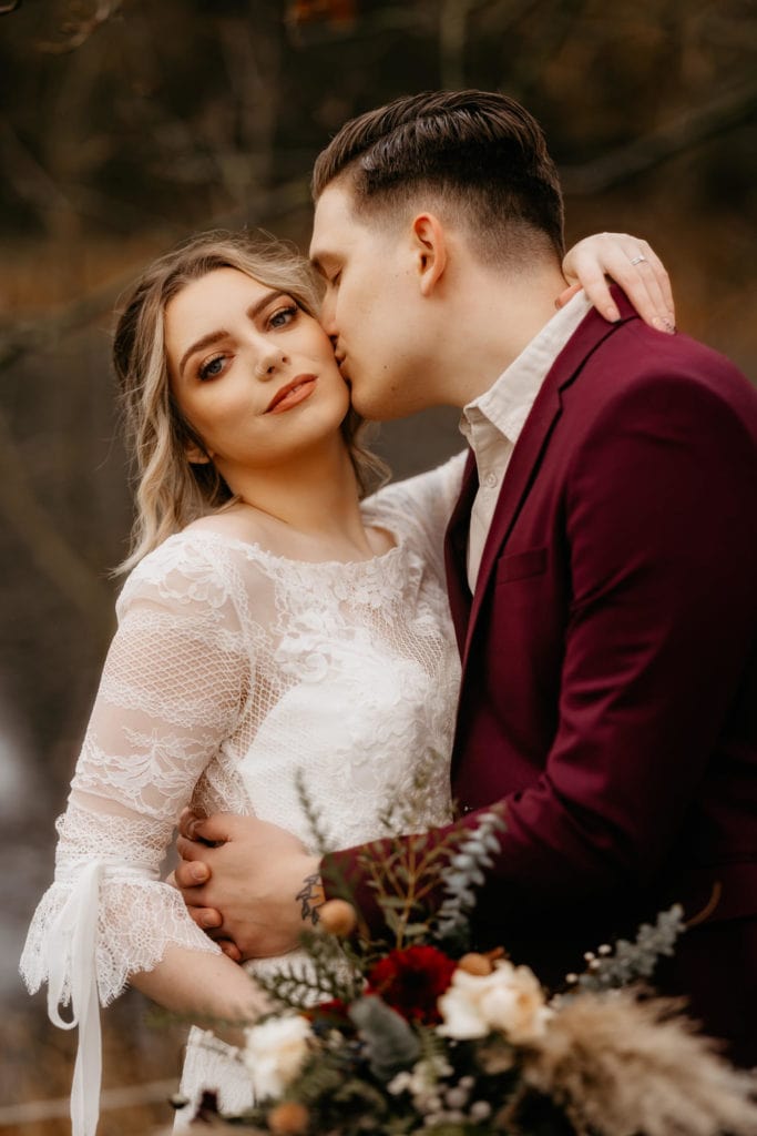 Scotland woodland elopement couple by a lake