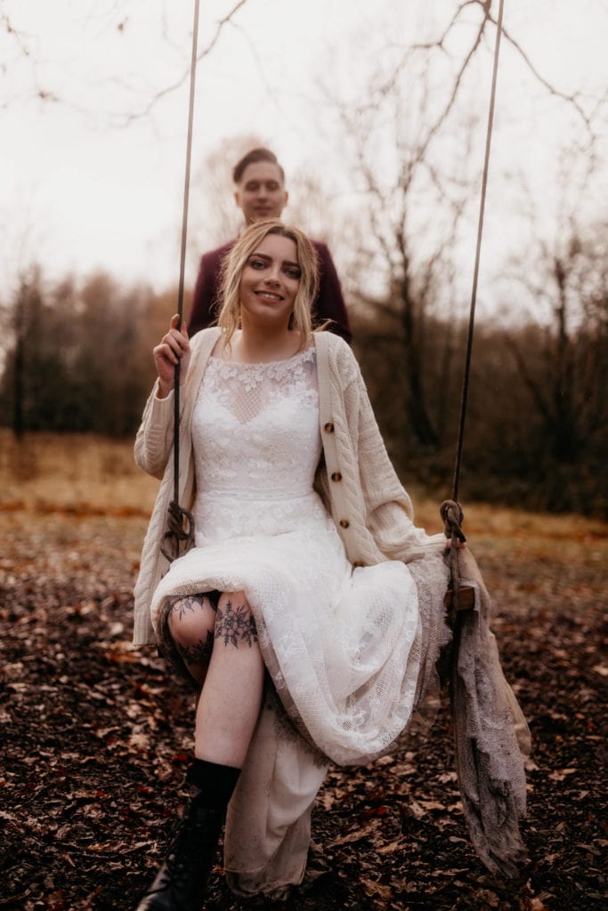Scotland woodland elopement couple. Hanging out by a swing.