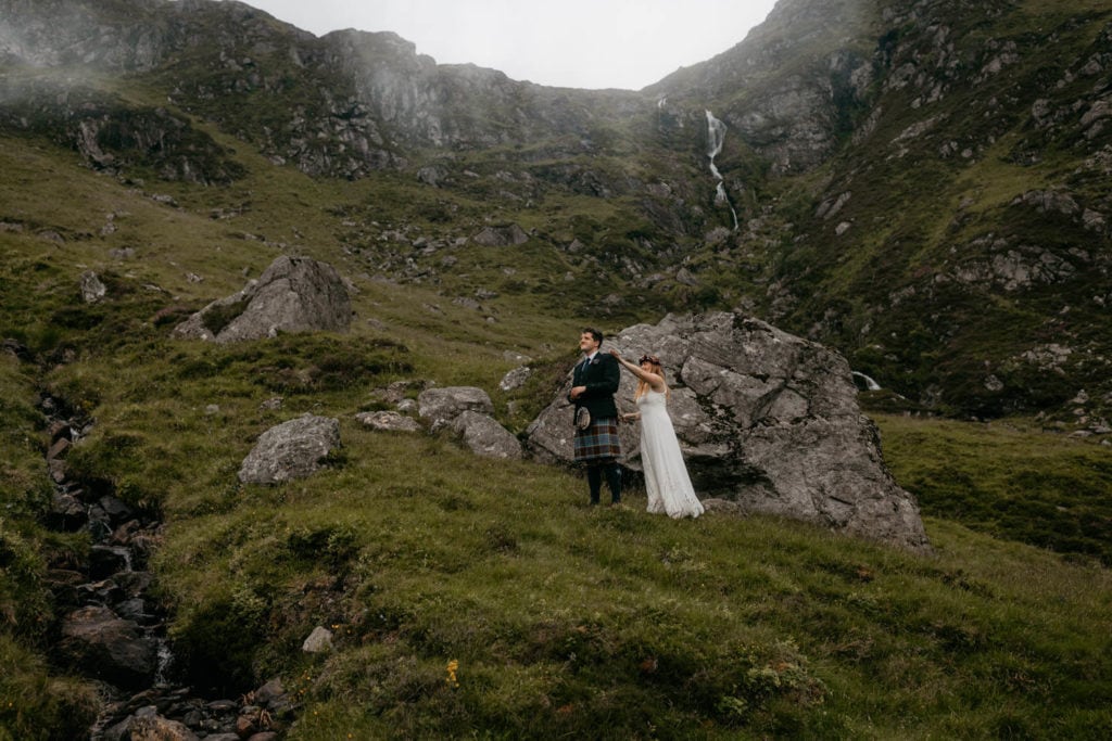 Bride approaching her groom before their first look on their Scottish elopement 