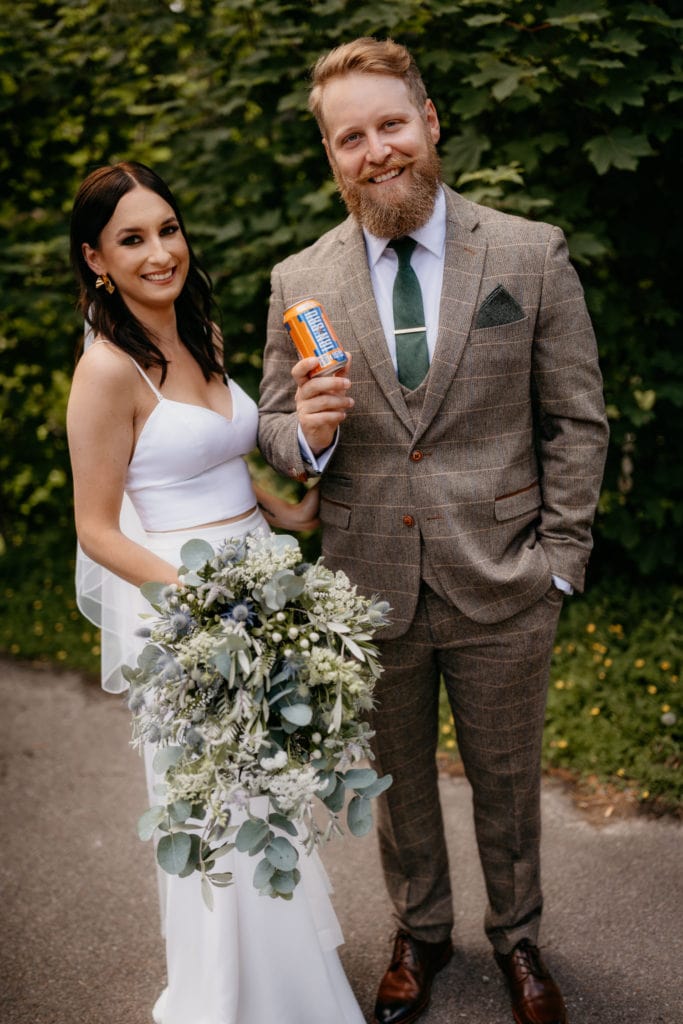 Bride and groom with irnbru can