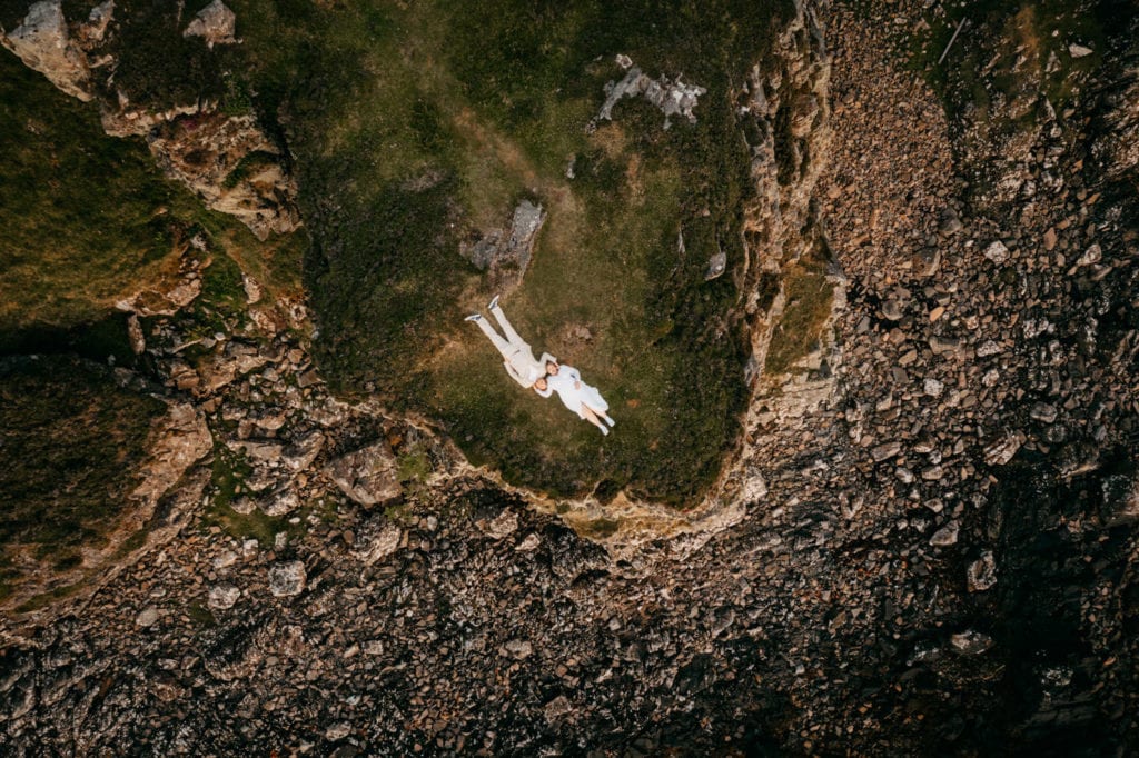 eloping couple by drone dunscaith castle, isle of skye