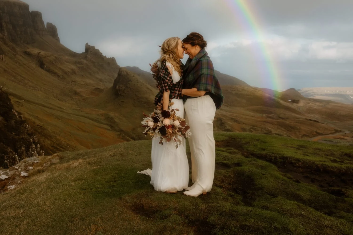 Two brides at the Quiraing with a rainbow, Isle of Skye